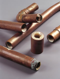 copper pipes with limescale